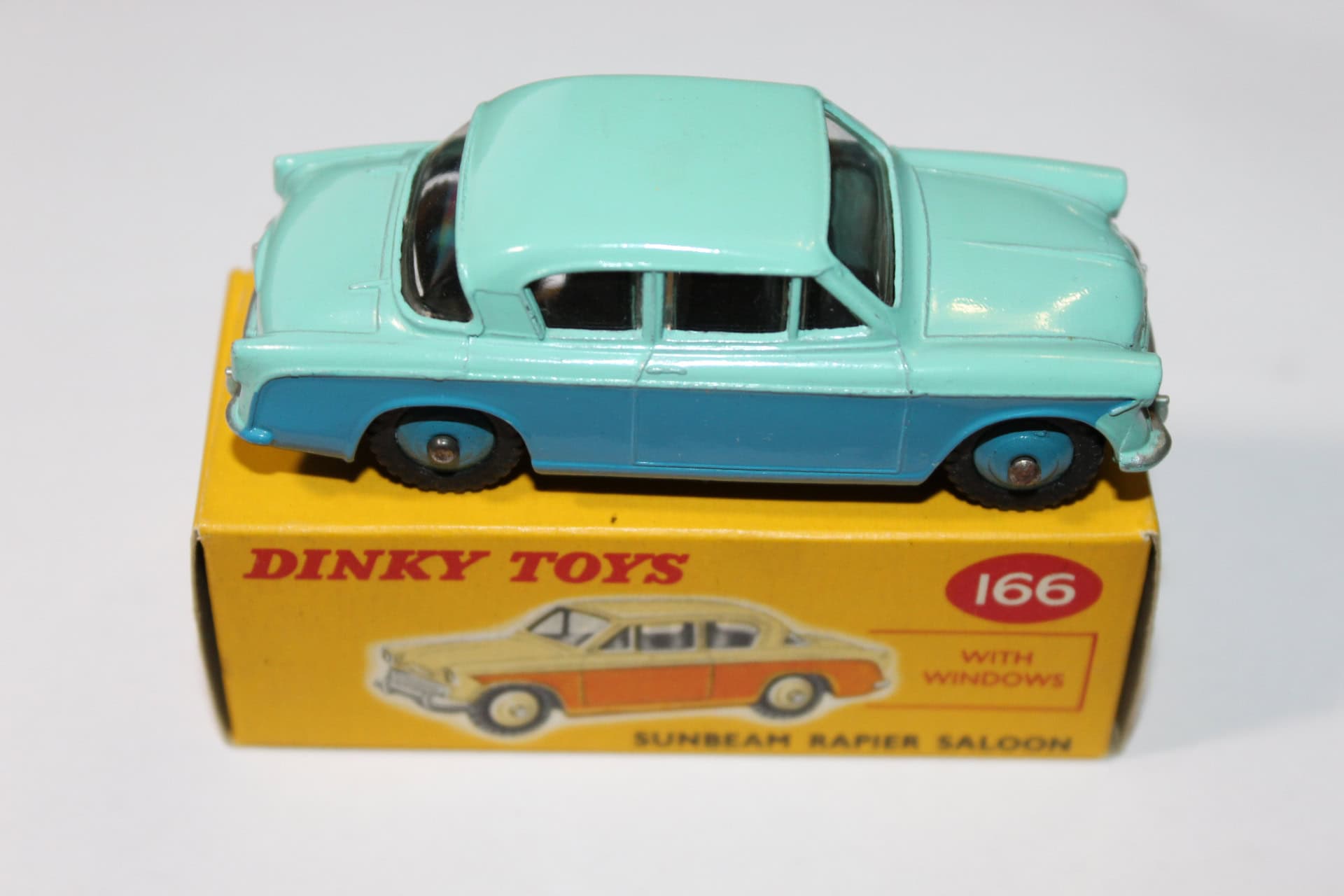 Vintage Dinky Toys 166 Sunbeam Rapier model car on original box.