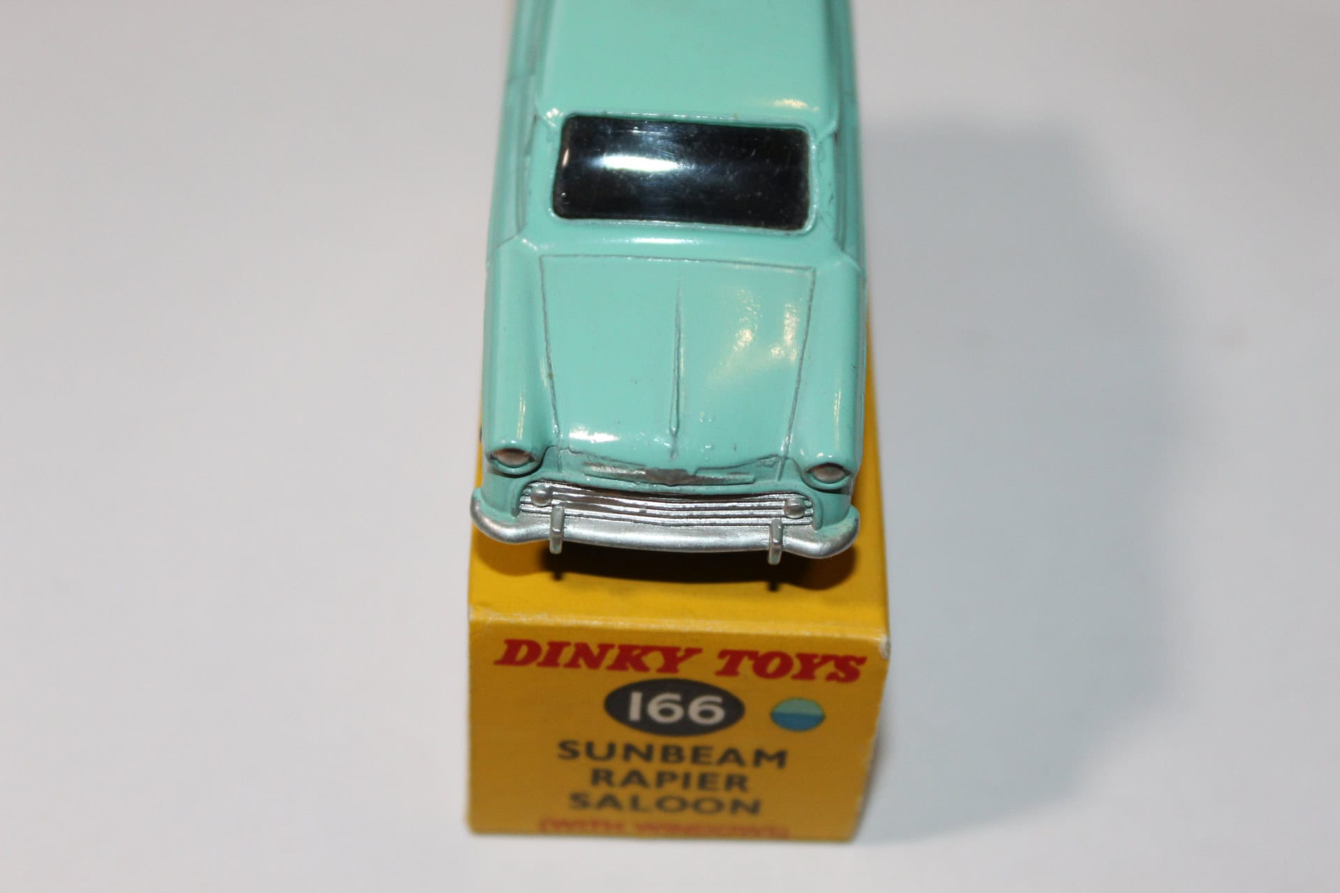 Dinky Toys 166 Sunbeam Rapier diecast model car on display.