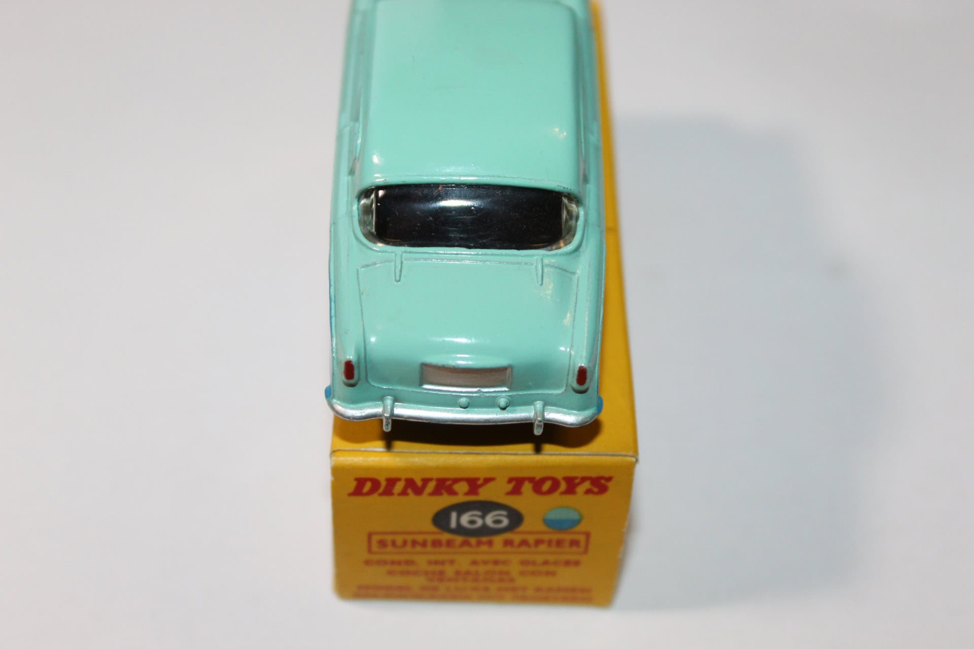 Dinky Toys 166 Sunbeam Rapier diecast model car on packaging box.