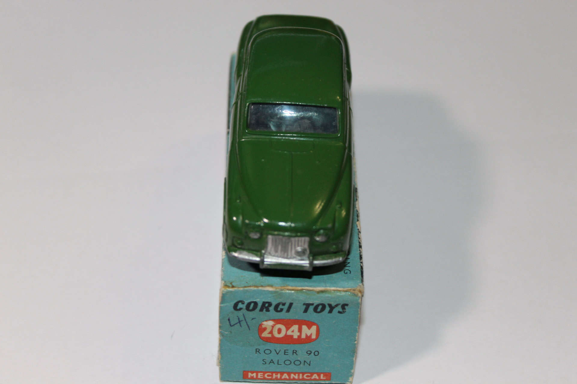 Detailed Corgi Toys 204M Rover 90 Saloon model in green with mechanical features.