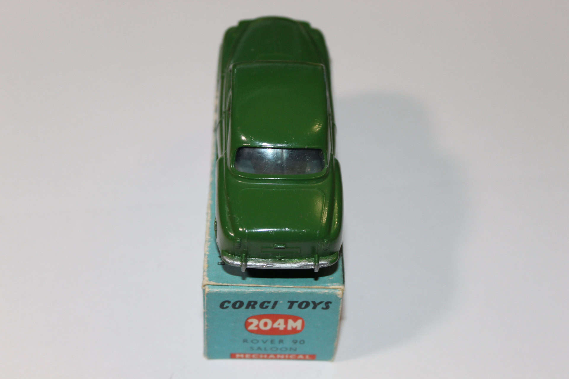 Vintage Corgi Toys 204M Rover 90 Saloon model car with mechanical features.
