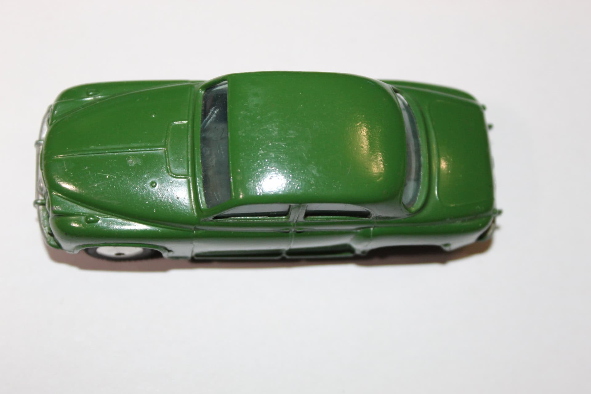 Detailed green Corgi Rover 90 Saloon diecast toy car for collectors.