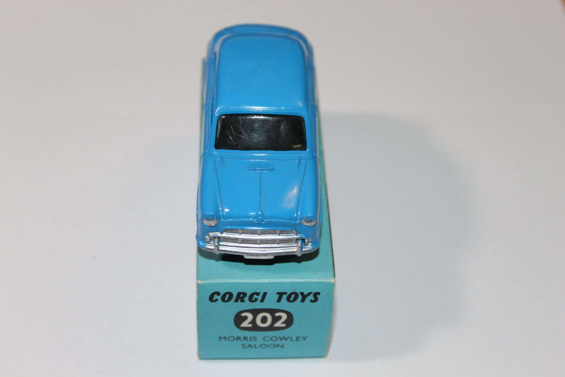 Corgi Toys 202 blue Morris Cowley diecast model car, vintage collectible from 1960s.