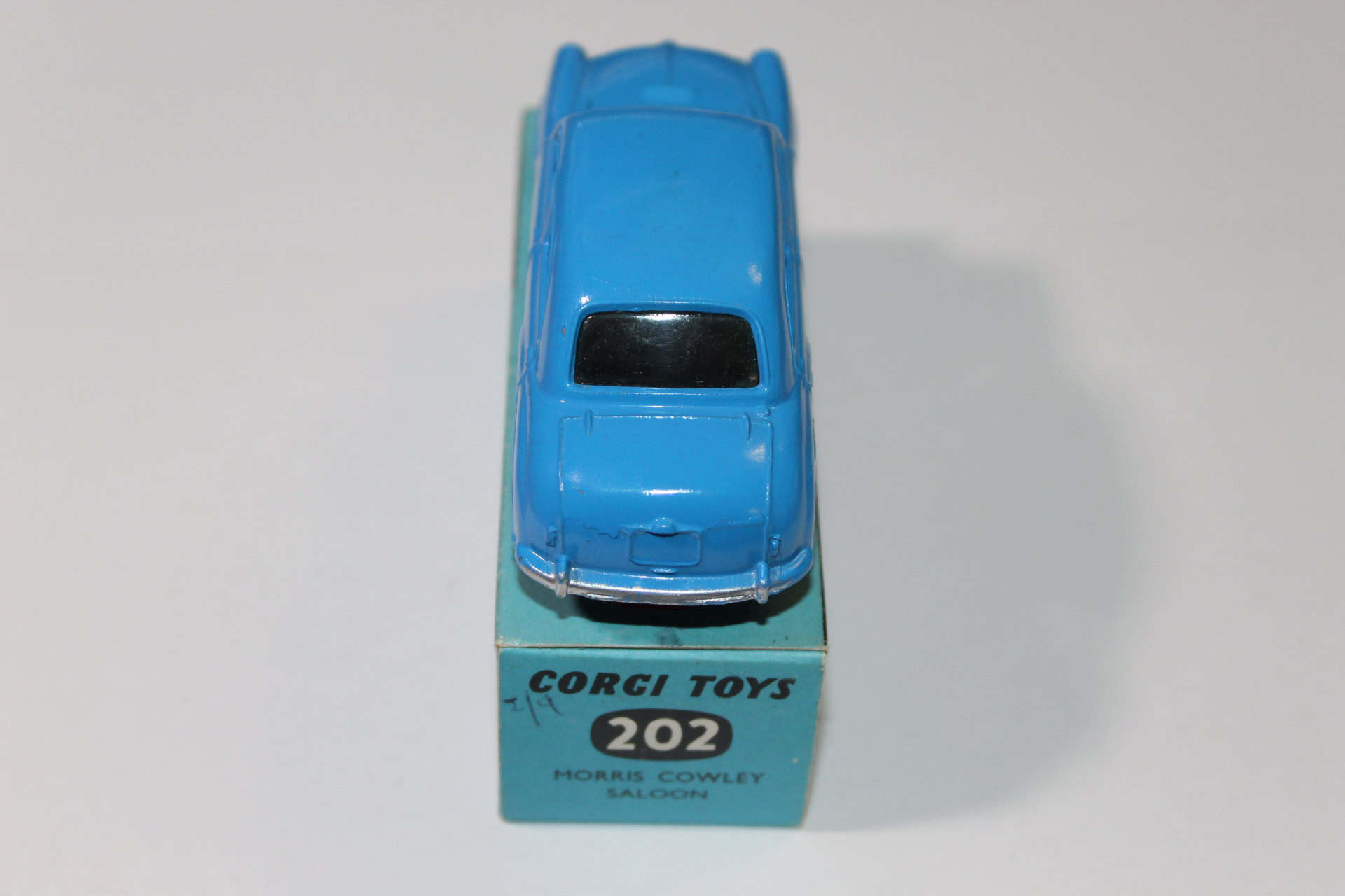 Vintage Corgi Toys 202 blue Morris Cowley diecast model car for collectors.