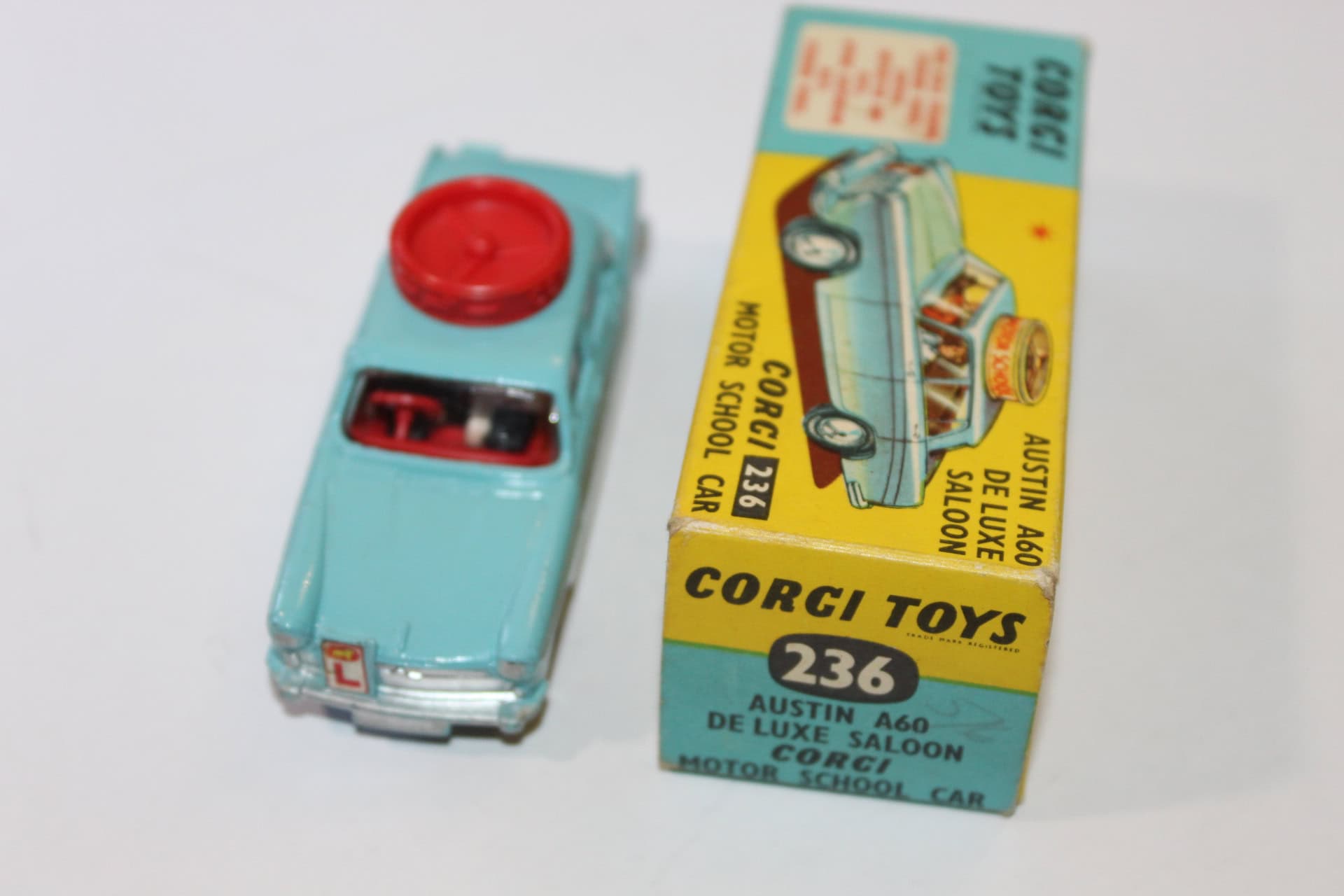 Vintage Corgi Toys 236 Motor School Car with original box.
