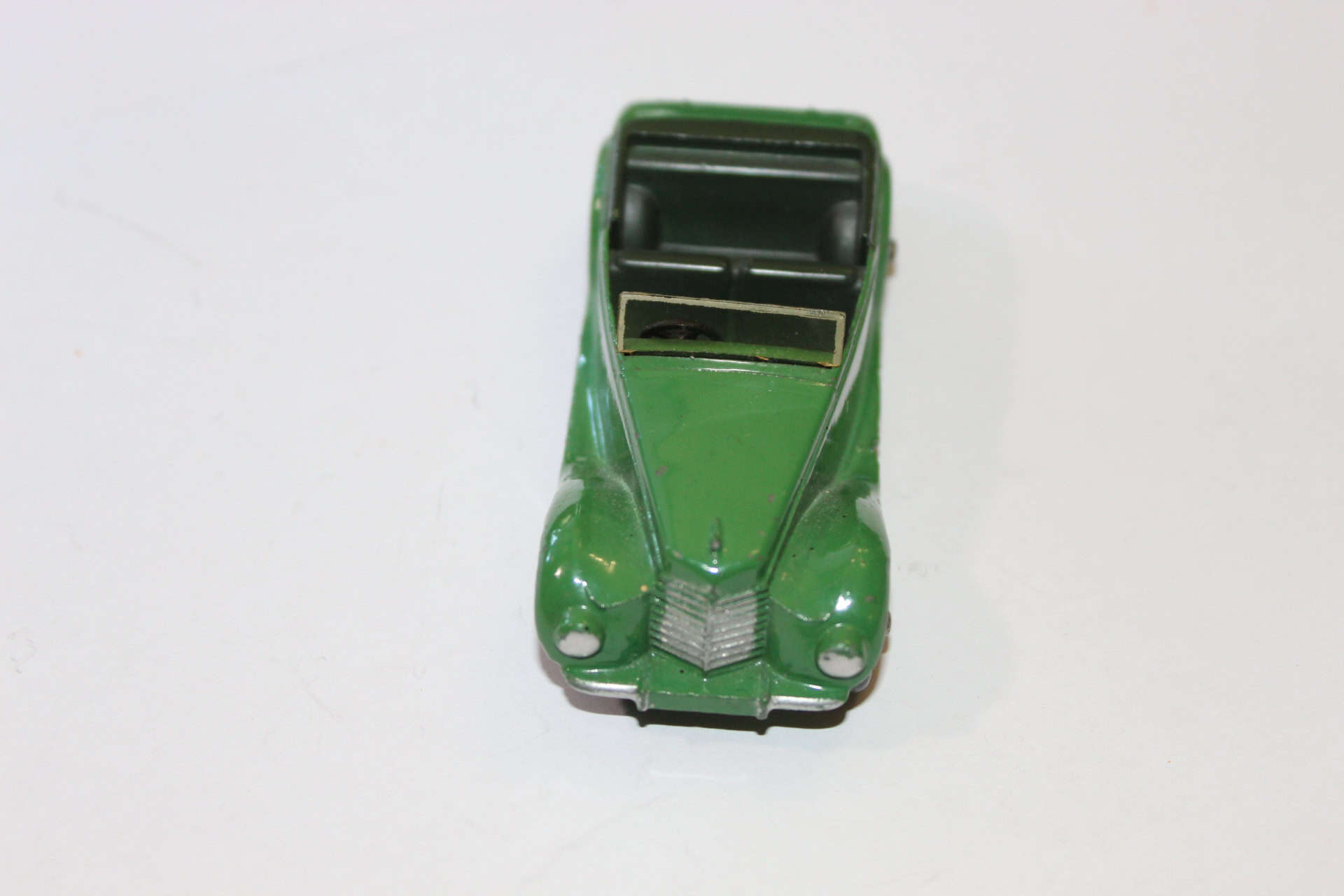 Vintage green Corgi Toys 236 Motor School Car model for collectors.