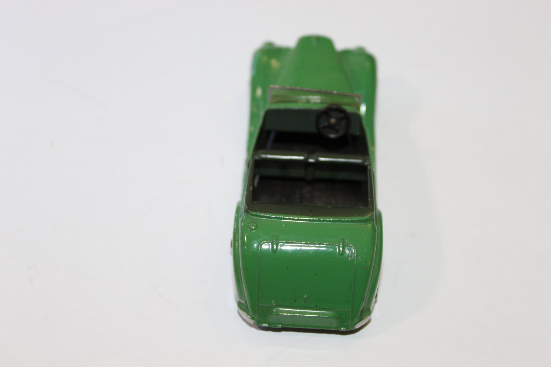 Vintage Corgi Toys 236 Motor School Car in green, diecast model for collectors.