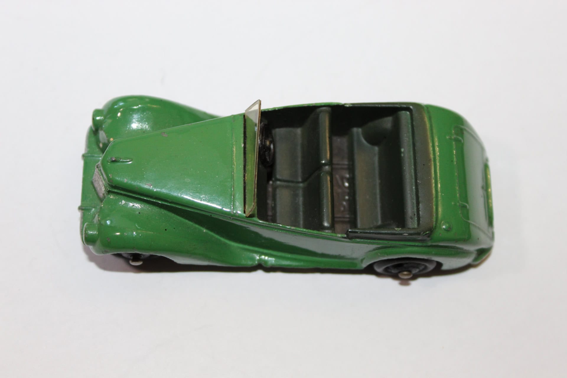Vintage Corgi Toys 236 Motor School Car in green, detailed diecast model for collectors.