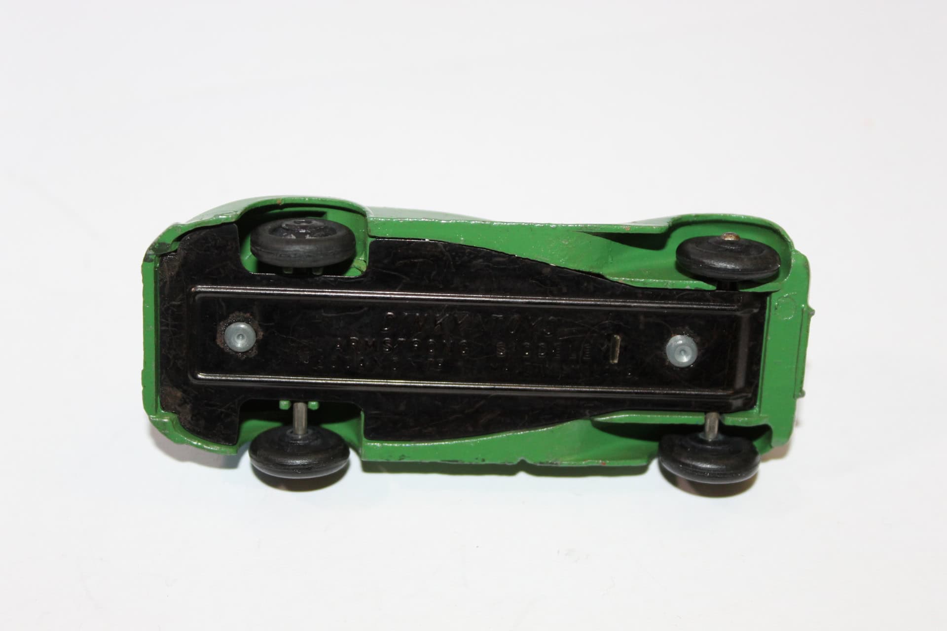 Vintage Corgi Toys 236 Motor School Car diecast model, underside view.