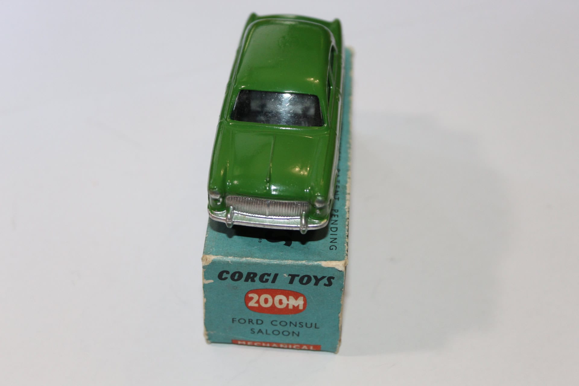 Vintage Corgi Toys 236 Motor School Car model on original box, collectible diecast vehicle.