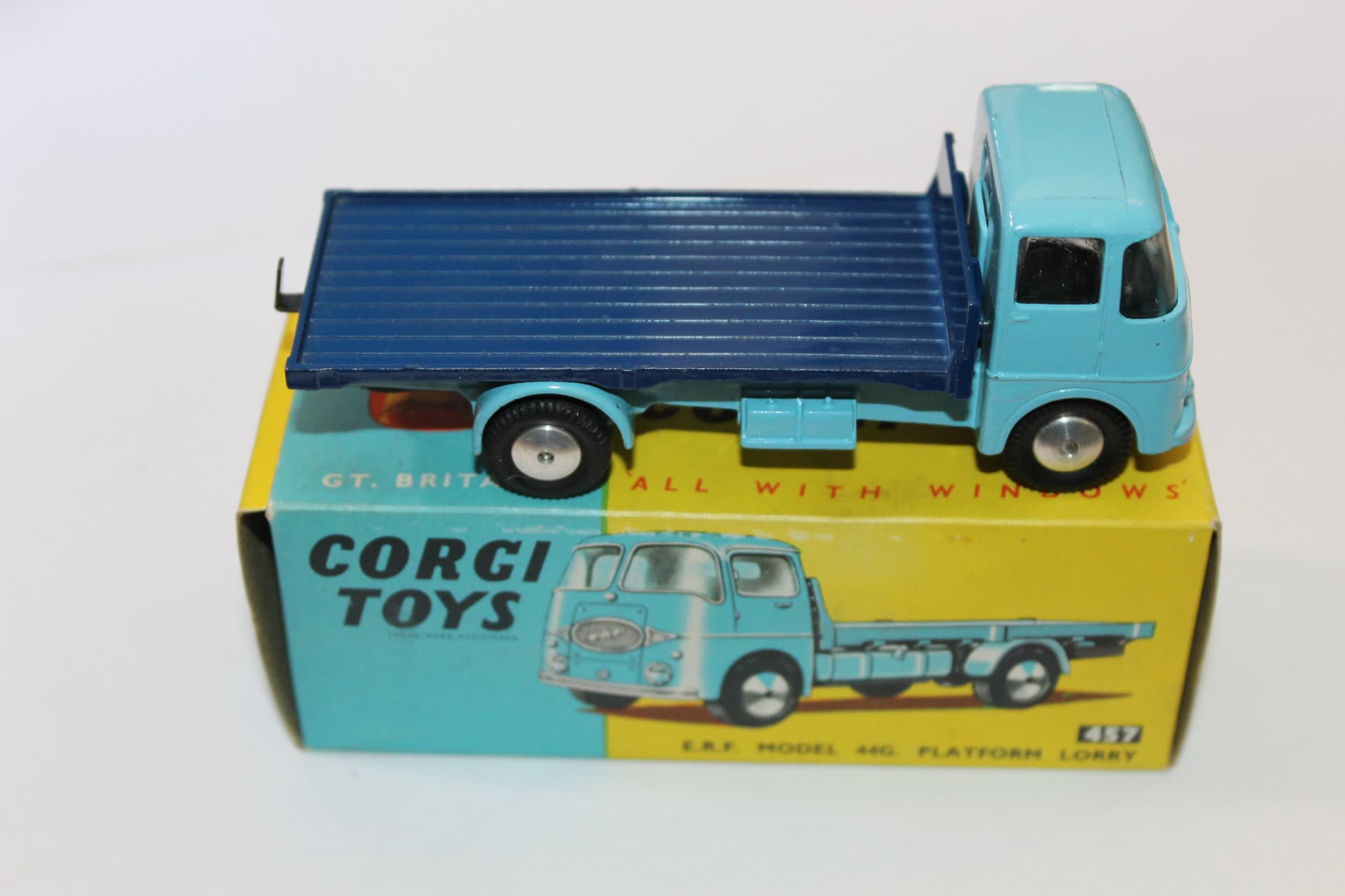 Corgi Toys 457 E.R.F. platform lorry model with blue flatbed and turquoise cab.