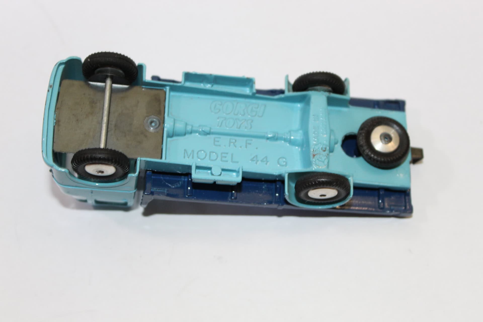 Detailed Corgi Toys 457 E.R.F. platform lorry model from the 1960s, showcasing vintage diecast const.