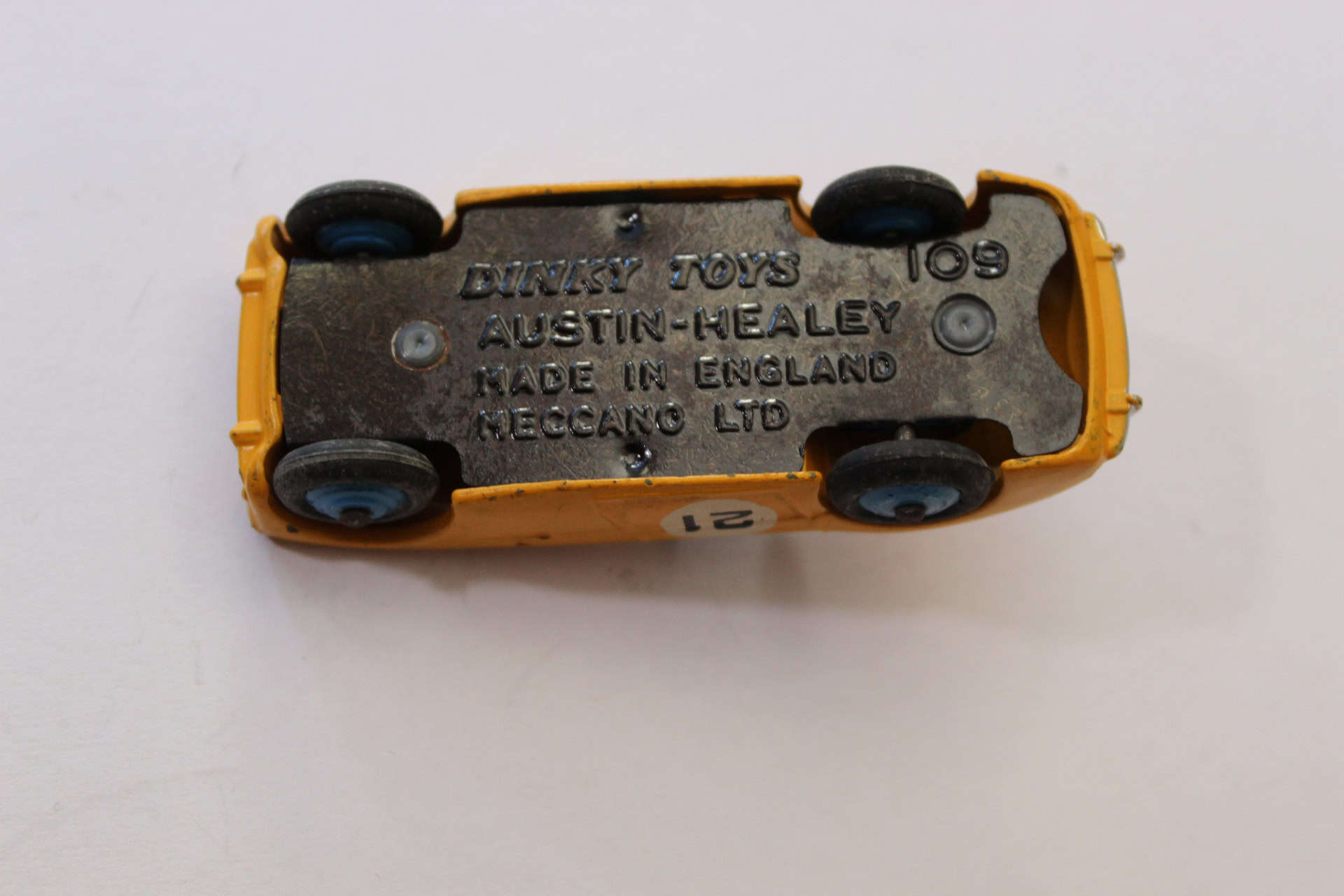 Vintage Dinky Toys 109 Austin Healey model car, diecast collectible, England.
