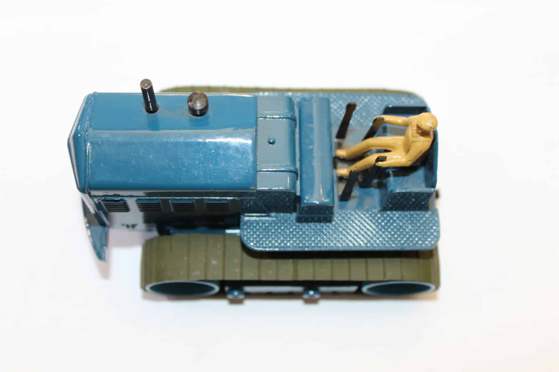 Dinky Toys 563 heavy tractor diecast model with driver figure, vintage toy vehicle for collectors.