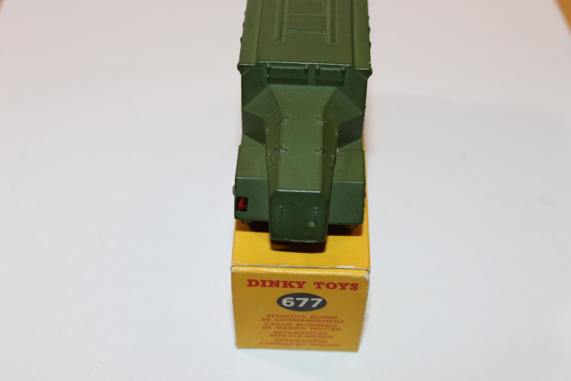 Dinky Toys 677 Armoured Command Vehicle on yellow box, vintage diecast model.