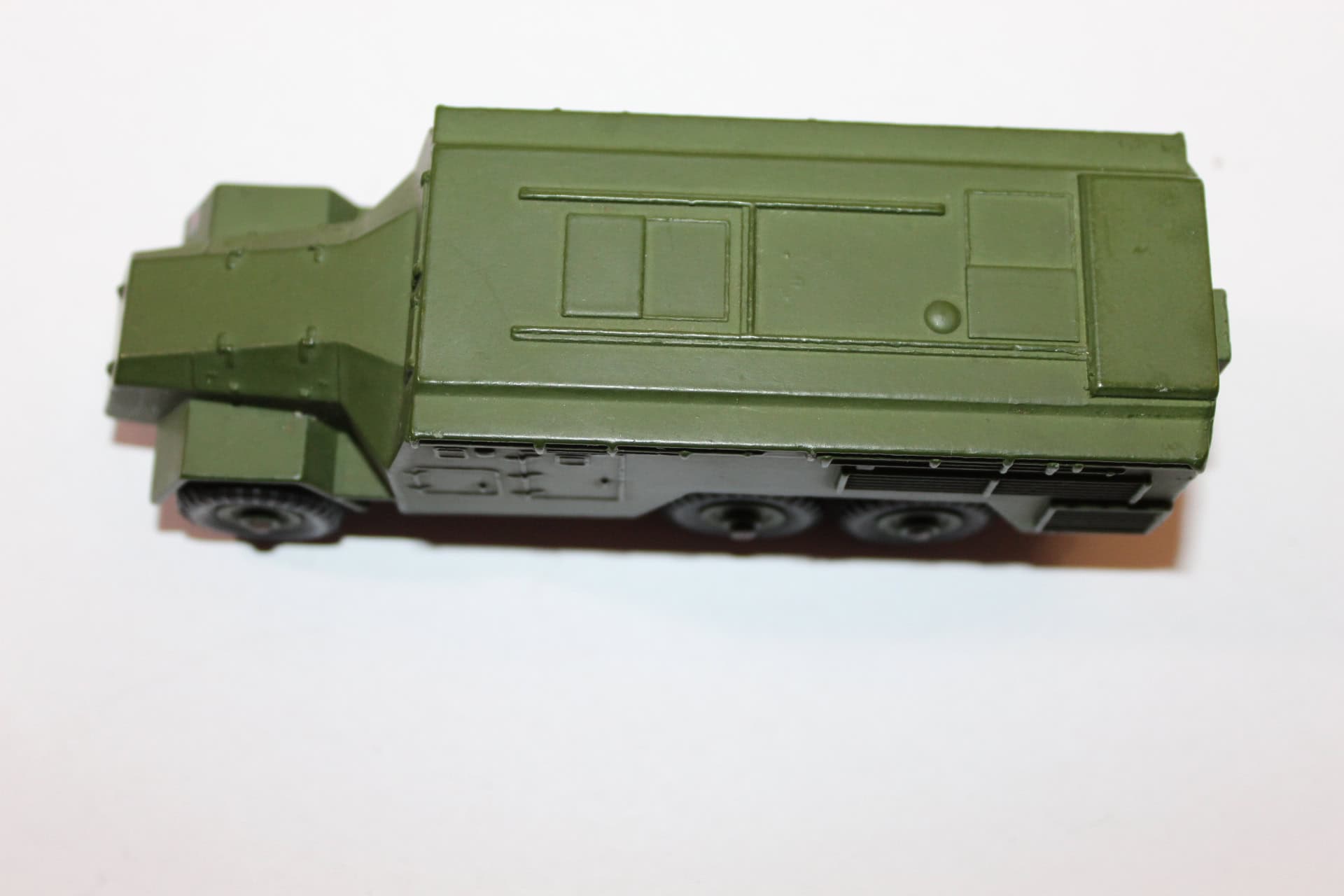 Dinky Toys 677 Armoured Command Vehicle in green, detailed military model for collectors.
