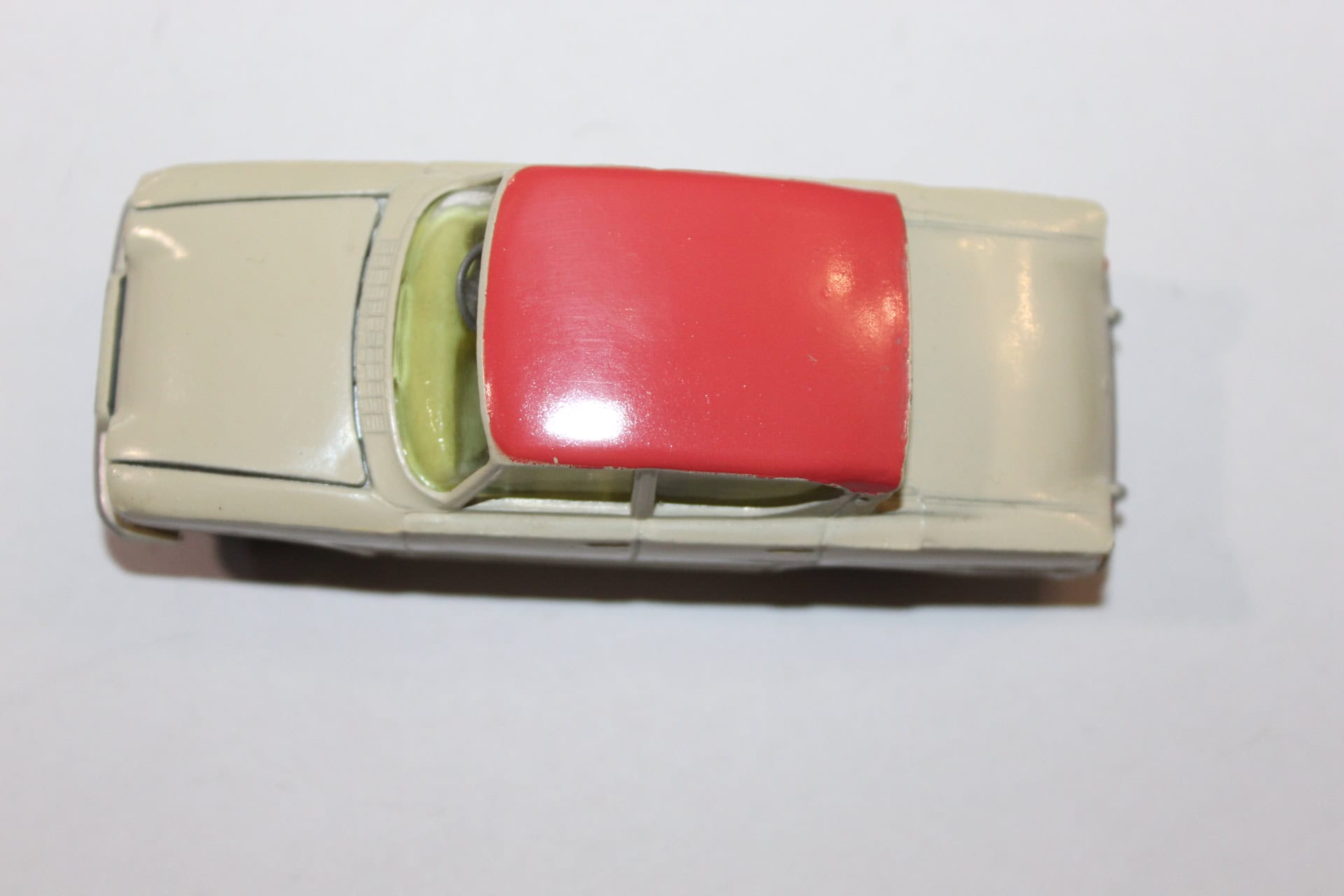 Vintage Corgi Ford Consul Classic diecast model car, cream with red roof, collectible toy.