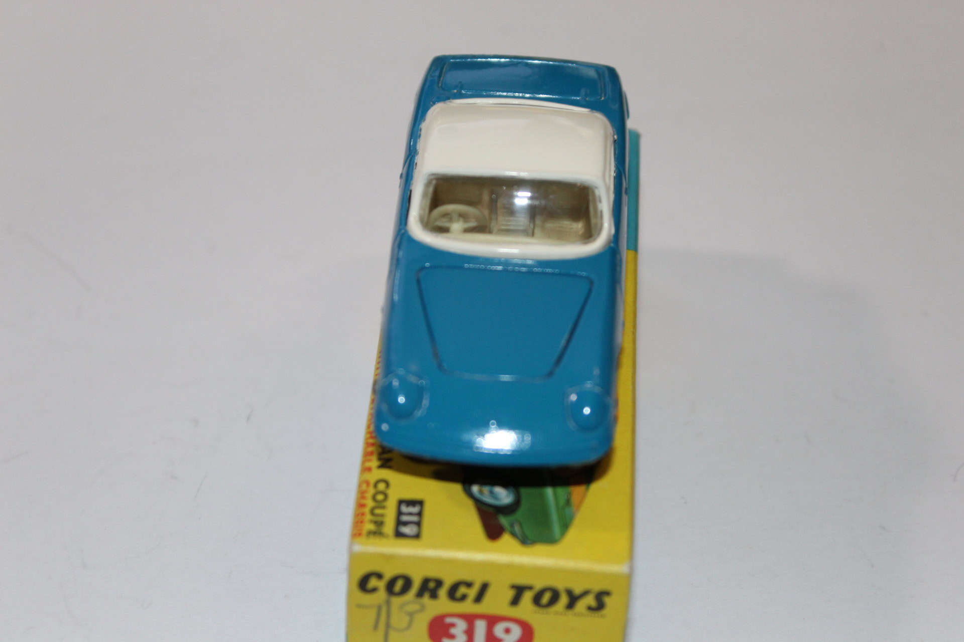 Vintage Corgi Toys 223 Chevrolet State Patrol diecast model car, blue and white police vehicle.