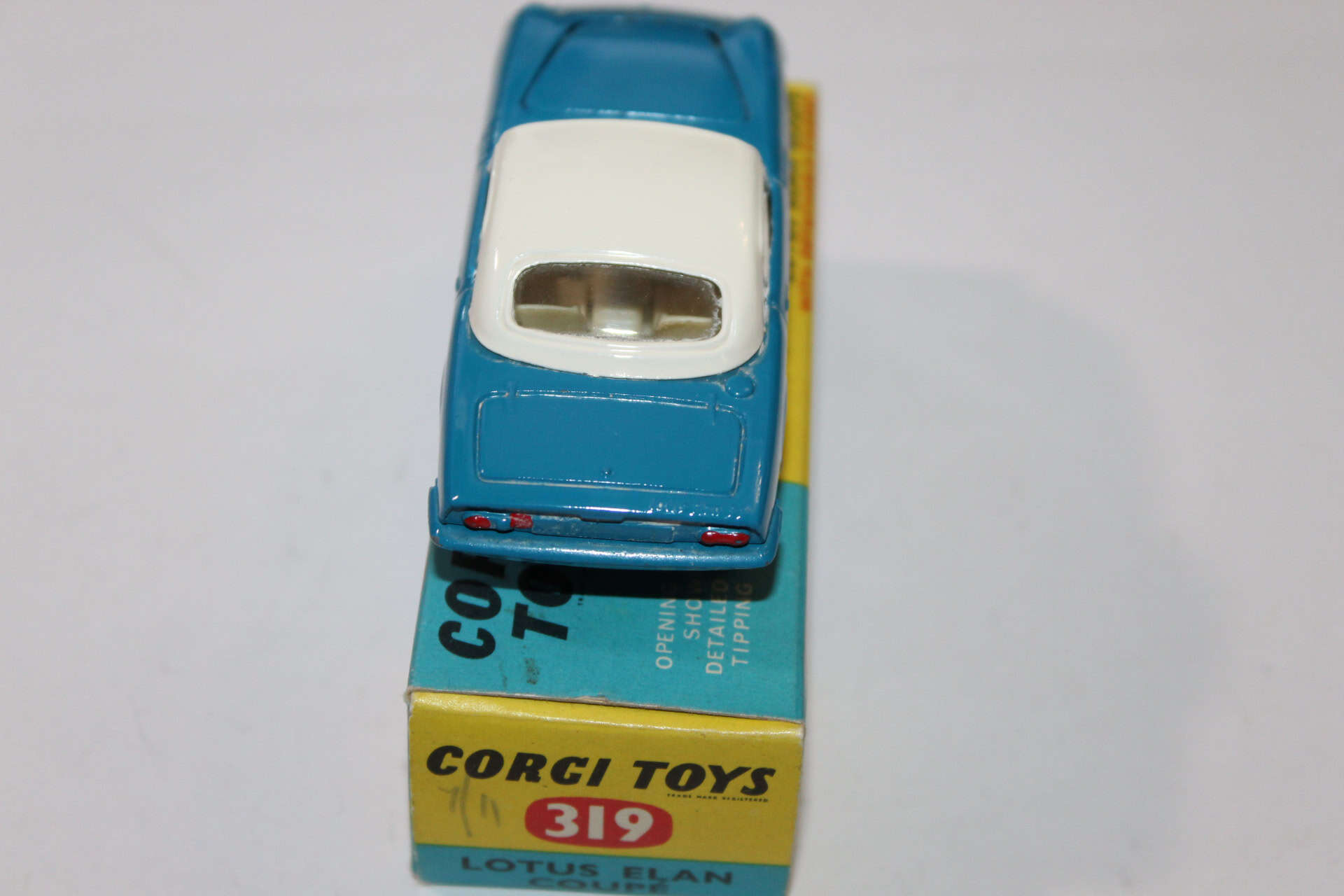 Vintage Corgi Toys 223 Chevrolet State Patrol diecast model car, blue and white, with patrol marking.