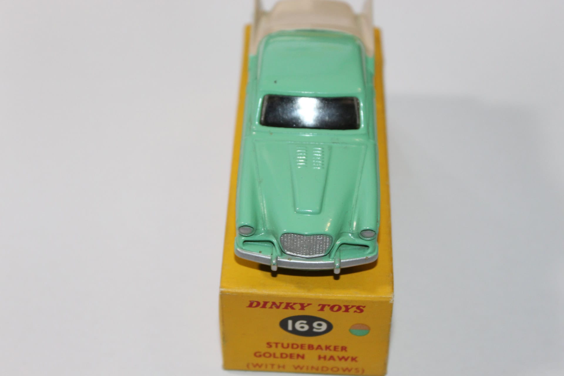 Vintage Corgi Land-Rover 477 breakdown truck toy with yellow box and window details.