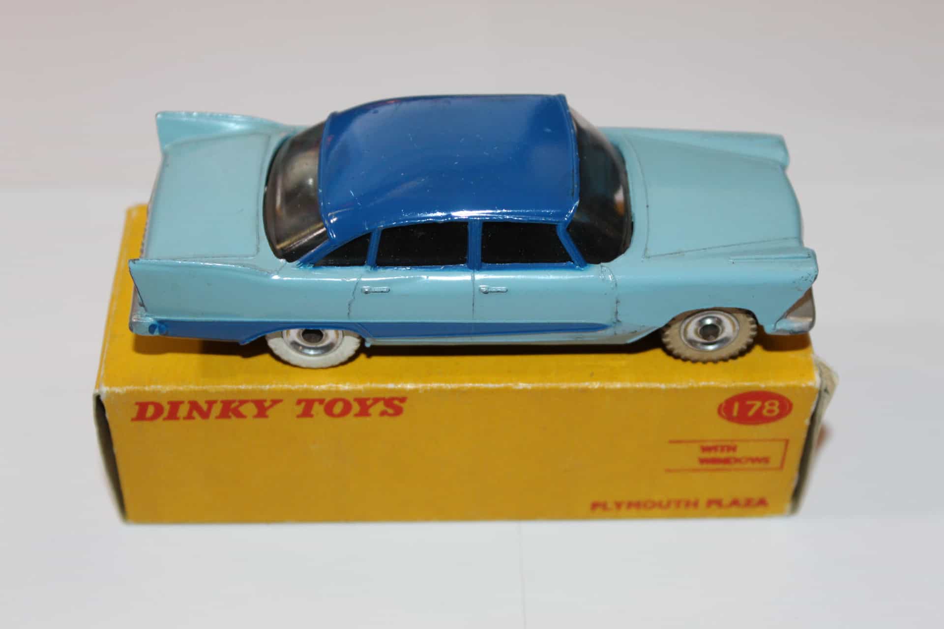 Dinky Toys 178 Plymouth Plaza diecast model car on original box, vintage collectible toy.