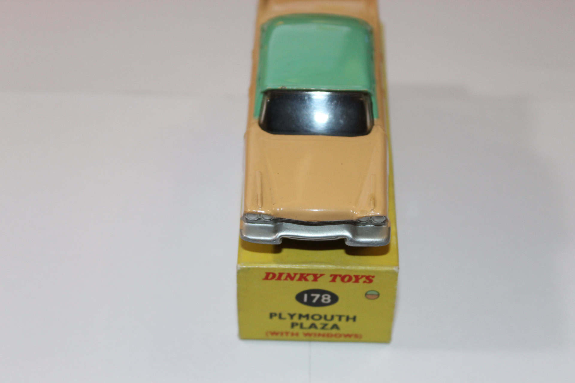Dinky Toys 178 Plymouth Plaza diecast model car on its original box, vintage collectible toy.