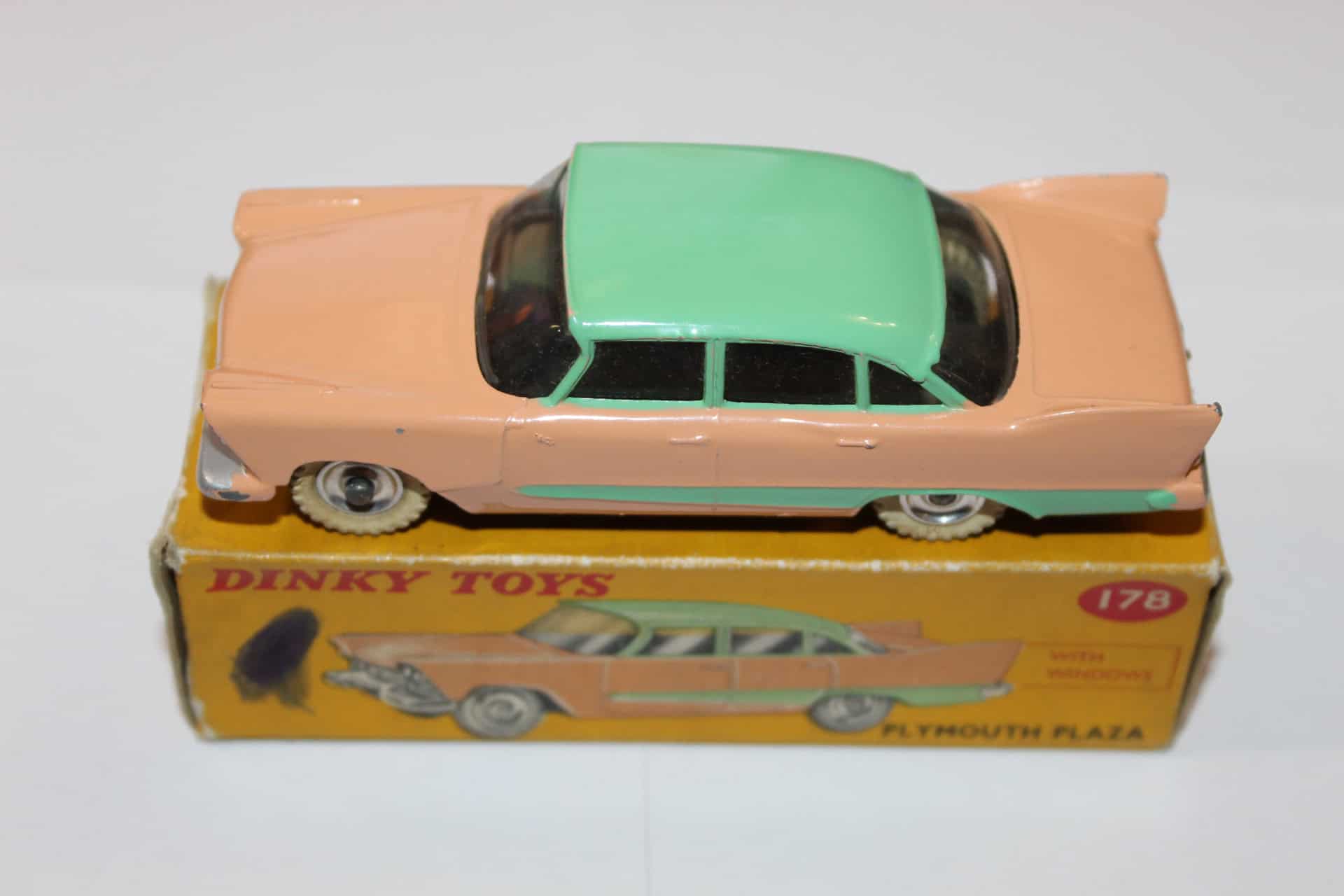 Dinky Toys 178 Plymouth Plaza diecast model car on box, vintage collectible toy.