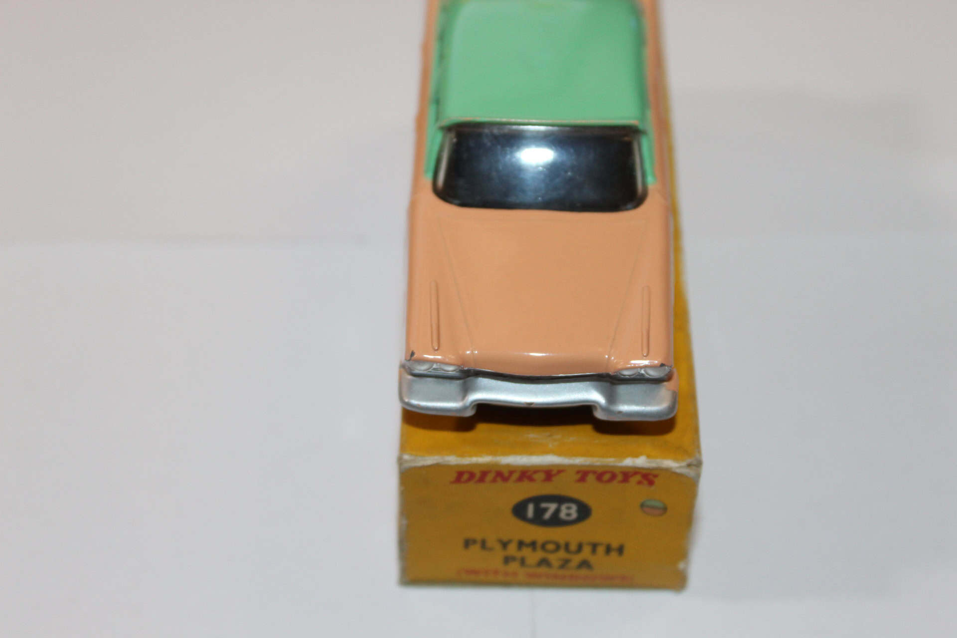 Dinky Toys 178 Plymouth Plaza diecast model car on original box, vintage collectible toy.
