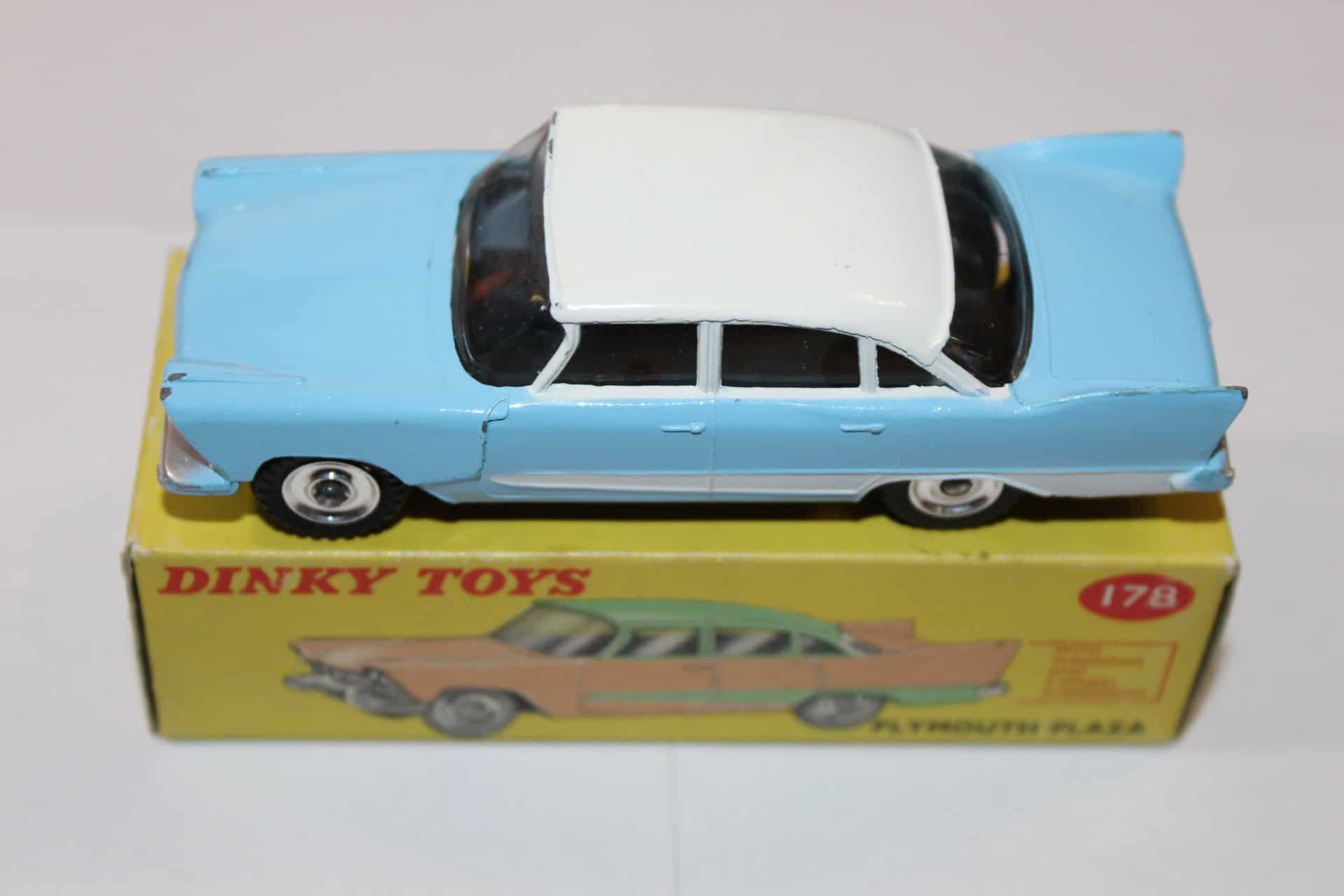 Dinky Toys 178 Plymouth Plaza diecast model car on its original box, vintage collectible.