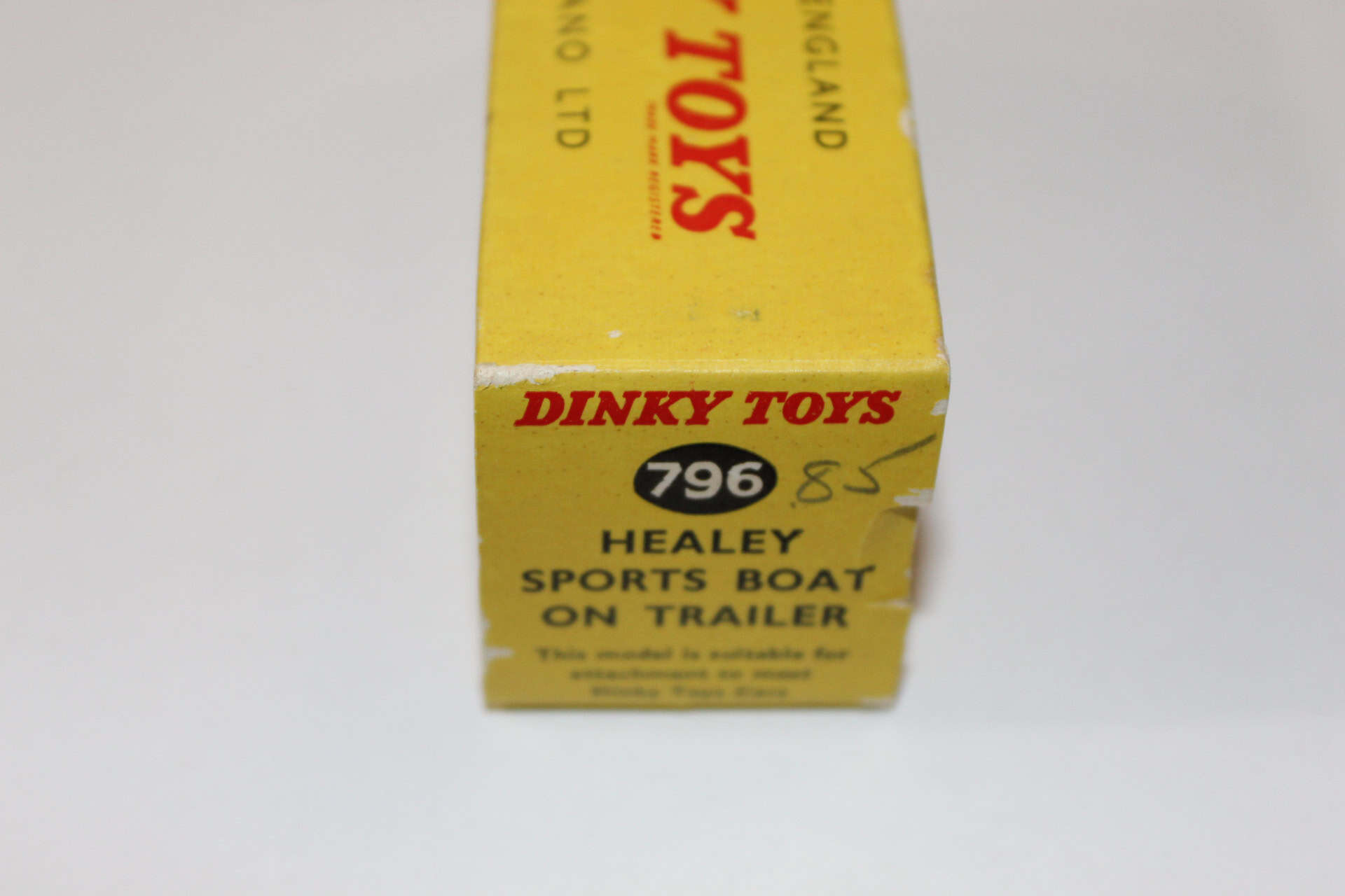 Dinky Toys 796 Healey sports boat model on yellow packaging box, vintage toy collectible.