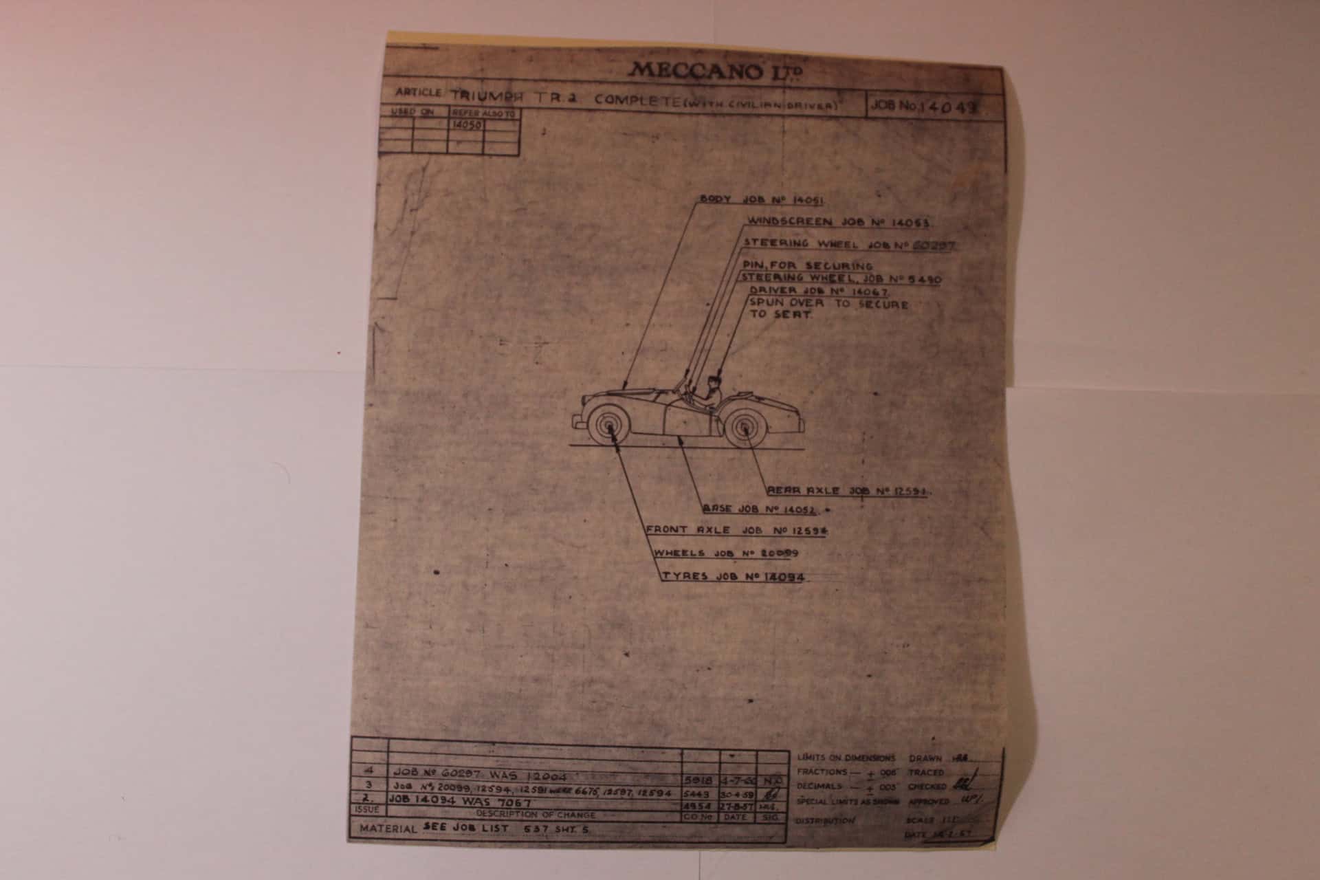 Factory line drawing of Dinky Toys 105 Triumph TR2 model car, vintage blueprint style.