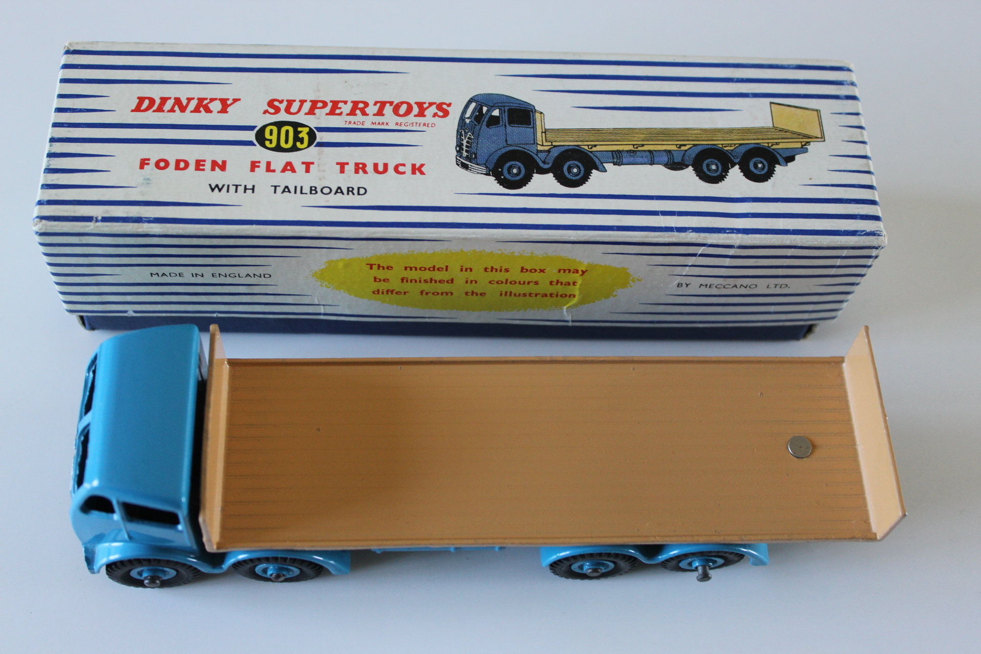 Vintage Dinky Supertoys Foden flat truck model with tailboard, collectible diecast vehicle.